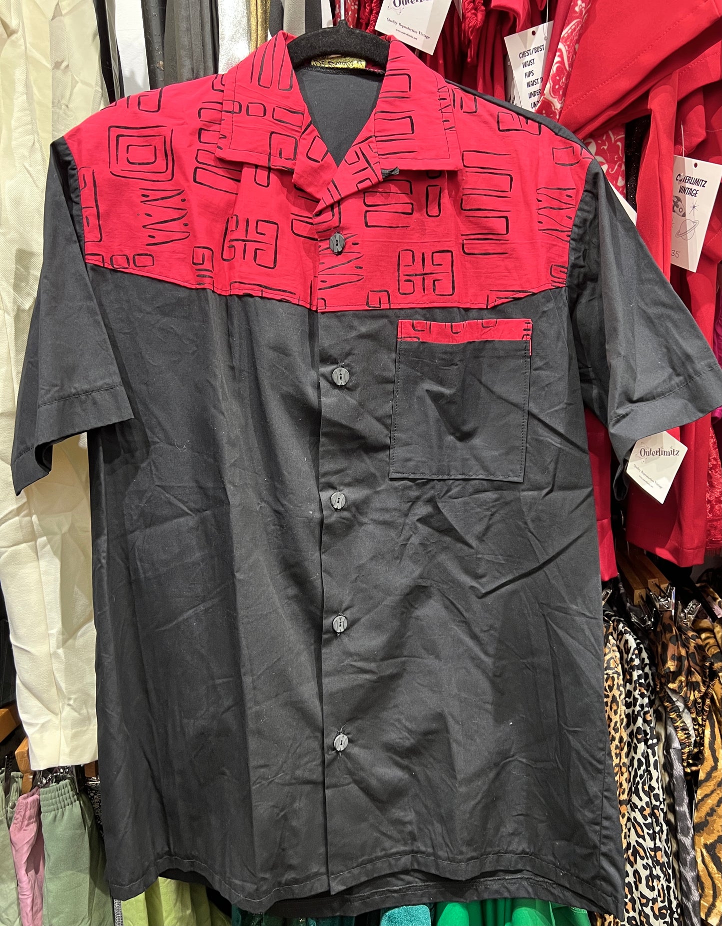Vintage 1950s short sleeved shirt in black with black flock on red contrast M